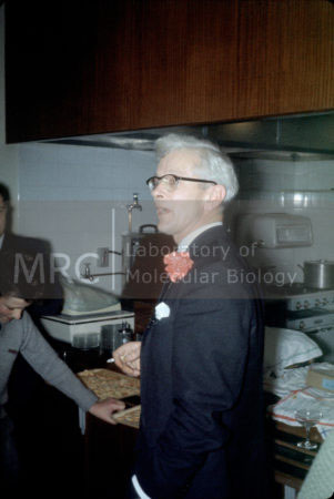 John Kendrew at a party in the LMB canteen to celebrate Max Perutz and Kendrew's 1962 Nobel Prize.