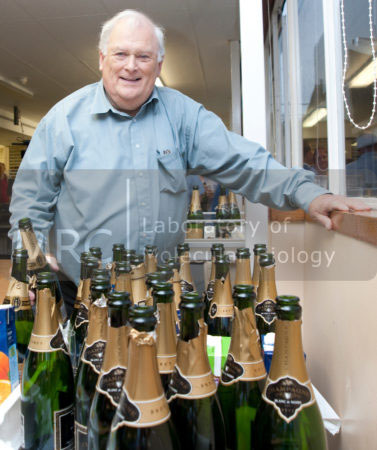 Michael Fuller serving champagne at the Nobel Party for Venki Ramakrishnan, 7 October 2009, in the LMB canteen.
