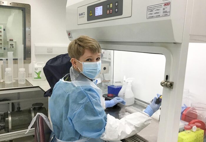 Anna Albecka-Moreau in the LMB’s newly opened Containment Level 3 laboratory