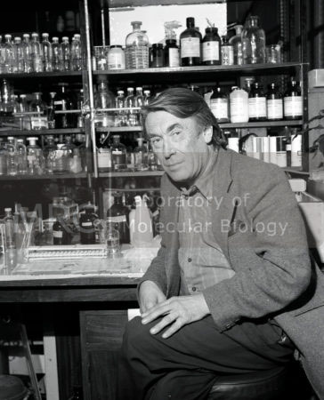 John Derek Smith, c. 1980s, photographed at his laboratory bench.
