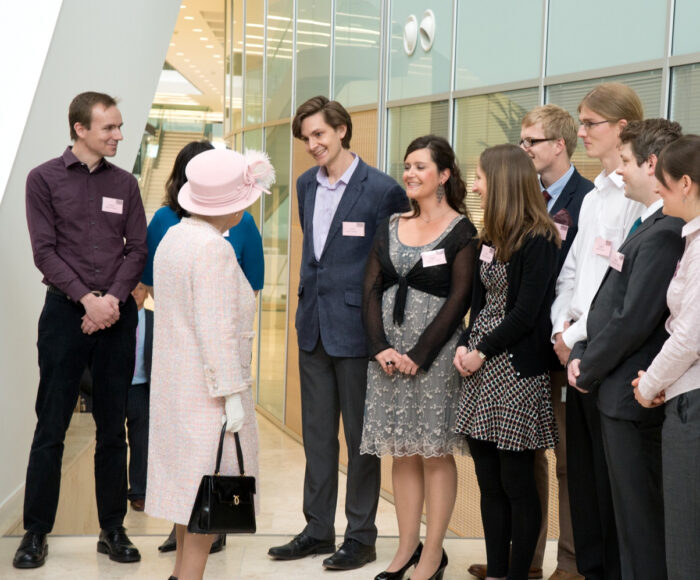 Kathrin greeting HM Queen Elizabeth II at the Official Opening of the new LMB Building in 2013]