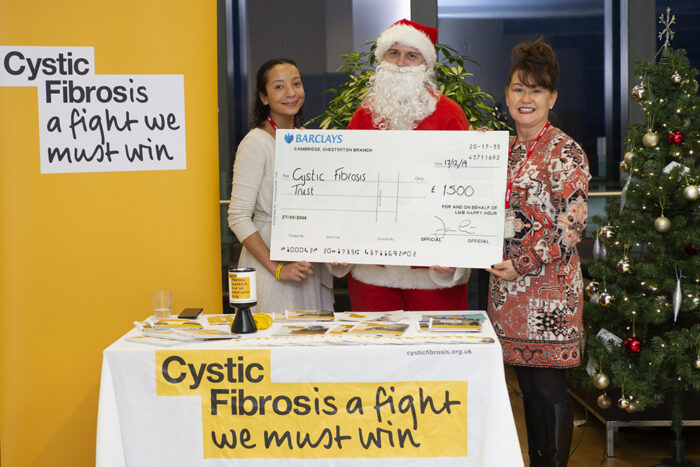 John O’Neill, presents Jessica Barnard and Sandra Howarth of The Cystic Fibrosis Trust with the LMB’s donation