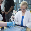 Girl pipetting at the Hands On Lab